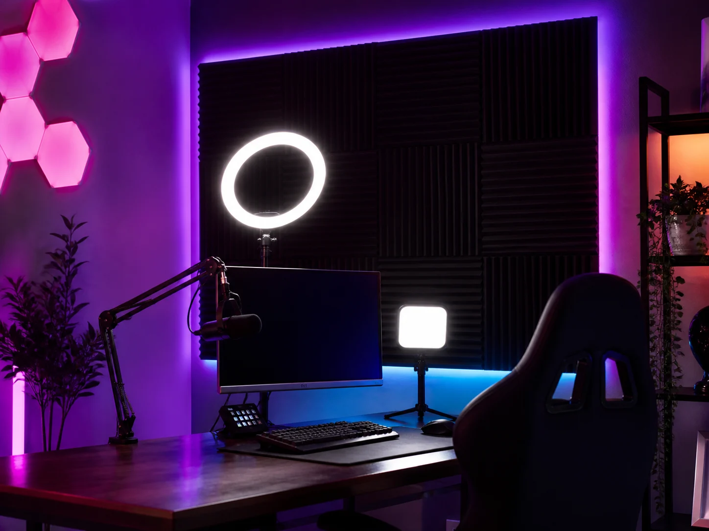 Neon style gaming and streaming room with acoustic panels