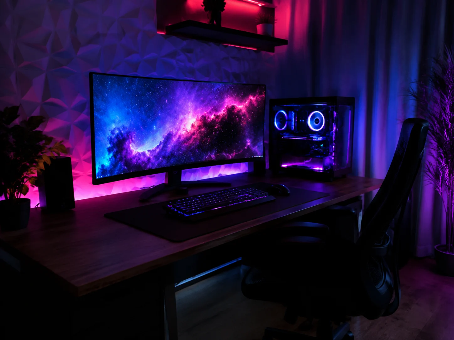 어두운 방 안에서 극적인 RGB 및 LED 앰비언트 조명이 켜진 게이밍 책상