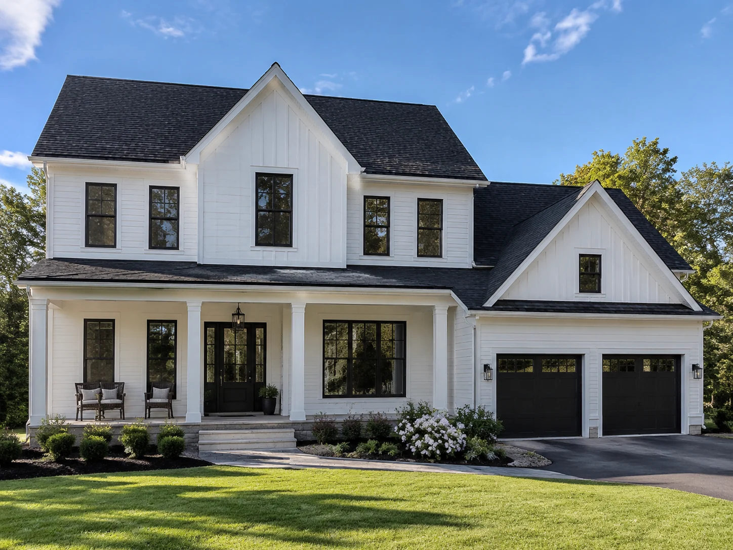 White house with a black roof showing the classic high-contrast roof design