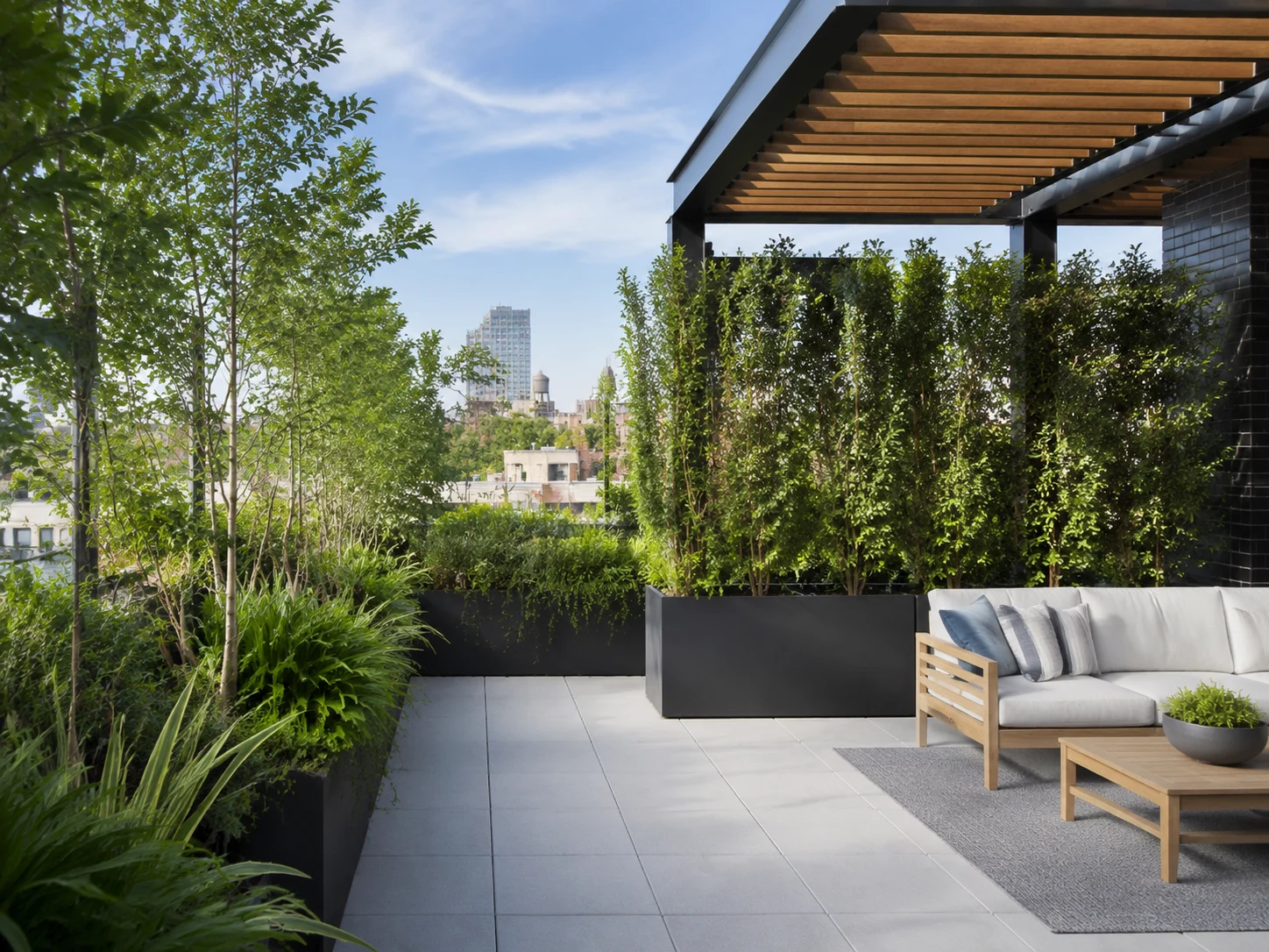 Rooftop with a pergola and planter screens for shade and privacy