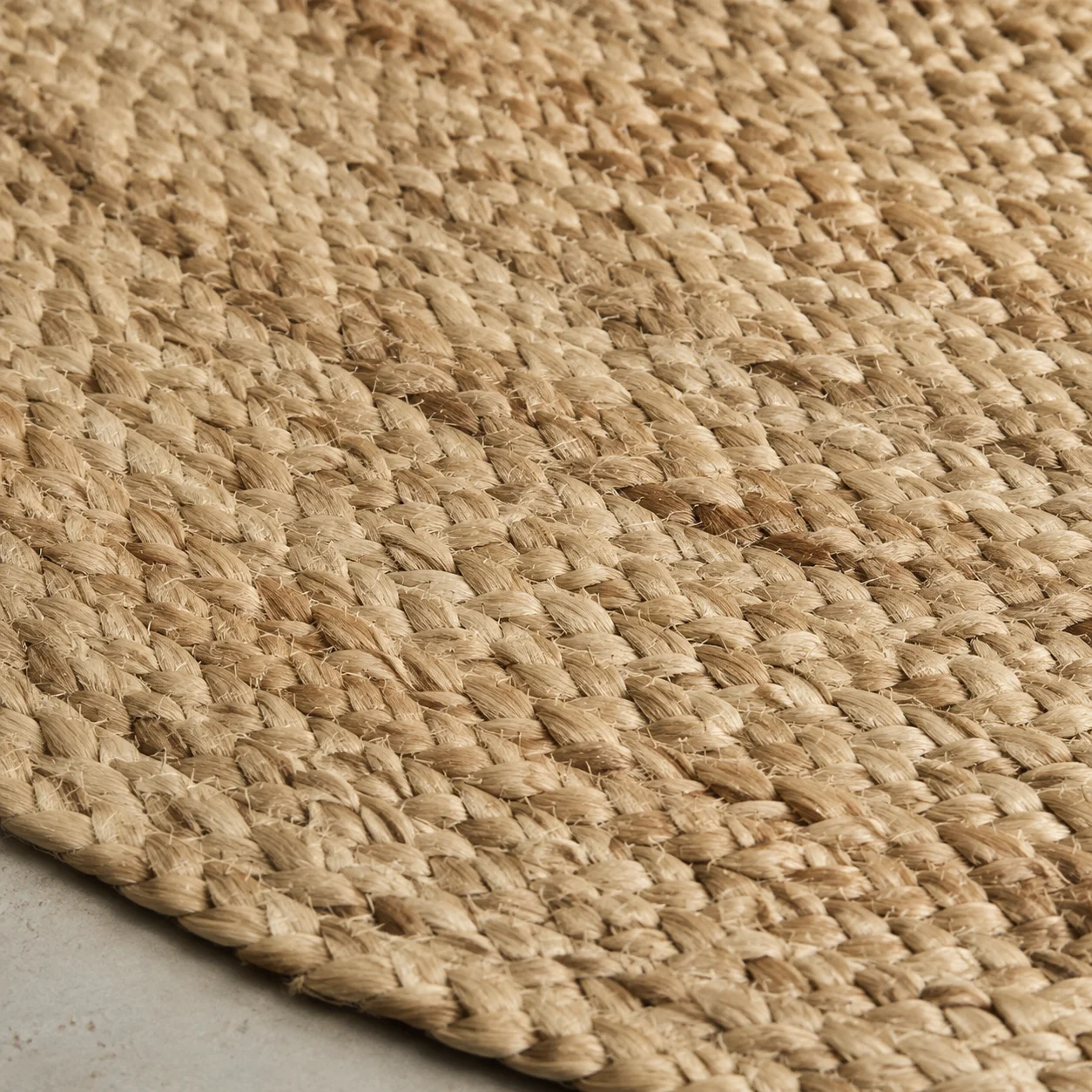 Detail of a braided natural jute rug