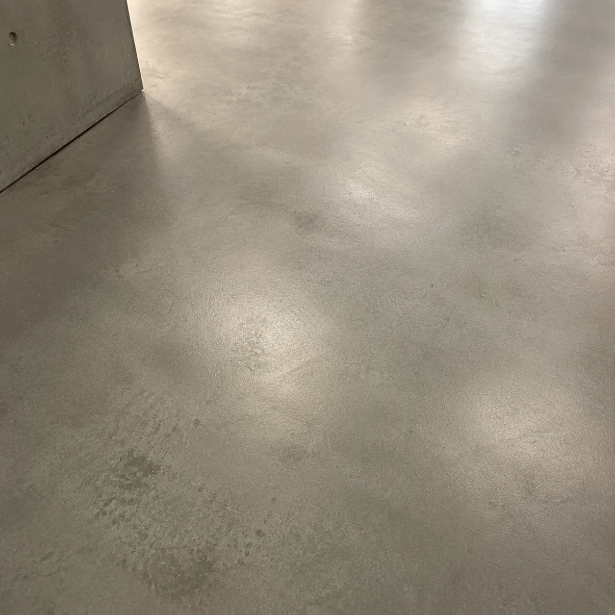 Smooth polished concrete floor texture.