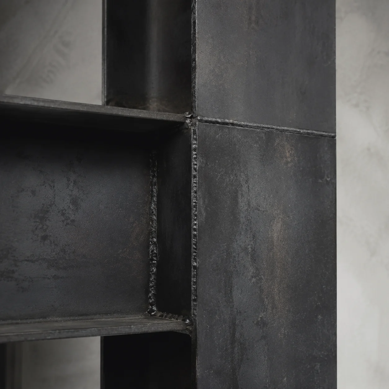 Close-up of matte blackened steel texture.