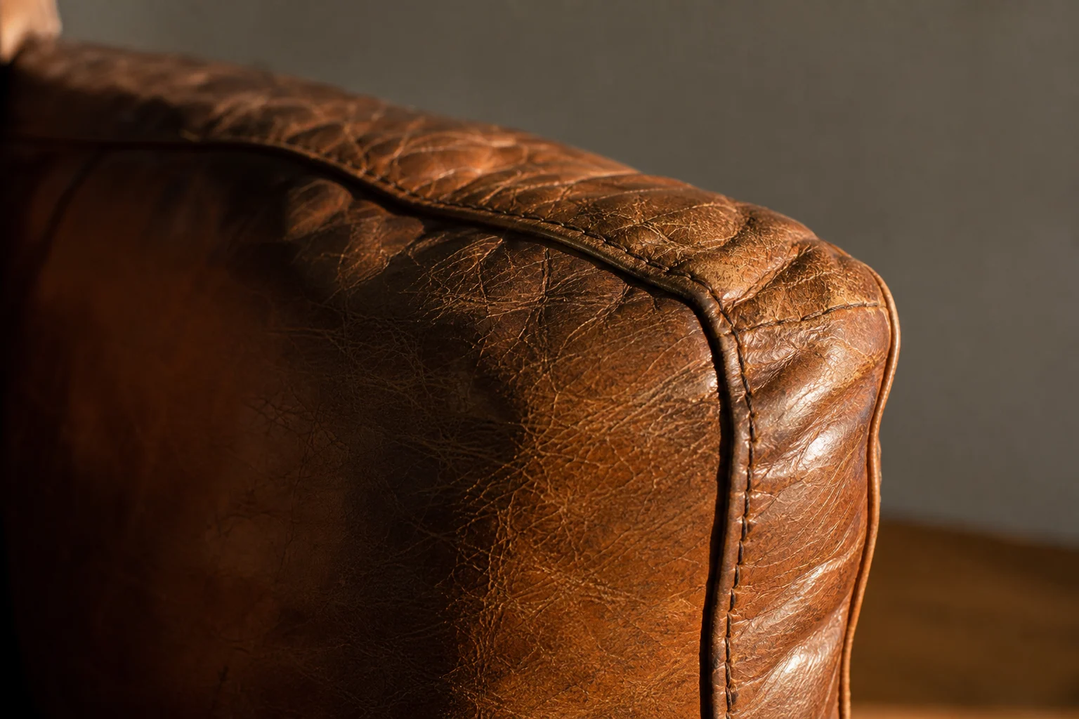 Detail of distressed cognac leather.